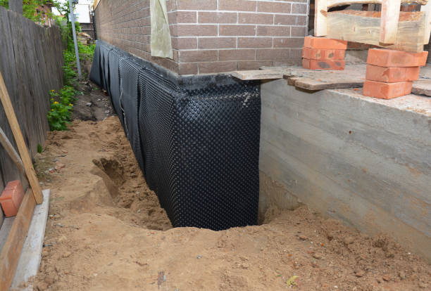 Happy homeowners after waterproofing job in Berlin Heights